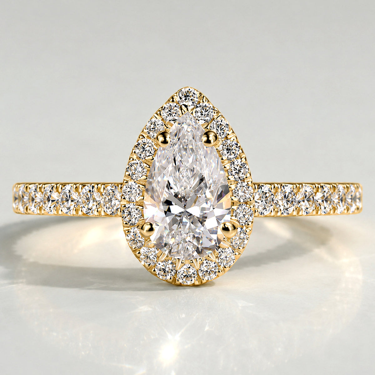 Classic Halo Design Pear Cut Lab Grown Diamond Cathedral Basket Pave Shank Engagement Ring With Round Cut Accent Stones #MCERL0060