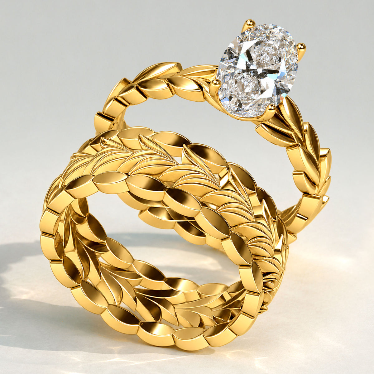 Nature Inspired Oval Cut Lab Grown Diamond Center Stone Hand Brushed Finish Bridal Set With Leaf Design Band #MCBSL0037