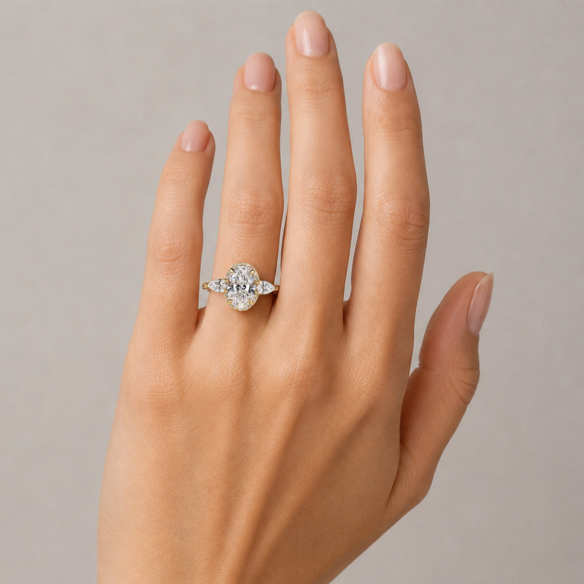 Halo Three Stones Modern Design Oval Cut Lab Grown Diamond Cathedral Basket Engagement Ring With Pear Cut And Round Cut Accent Stones #MCERL0096