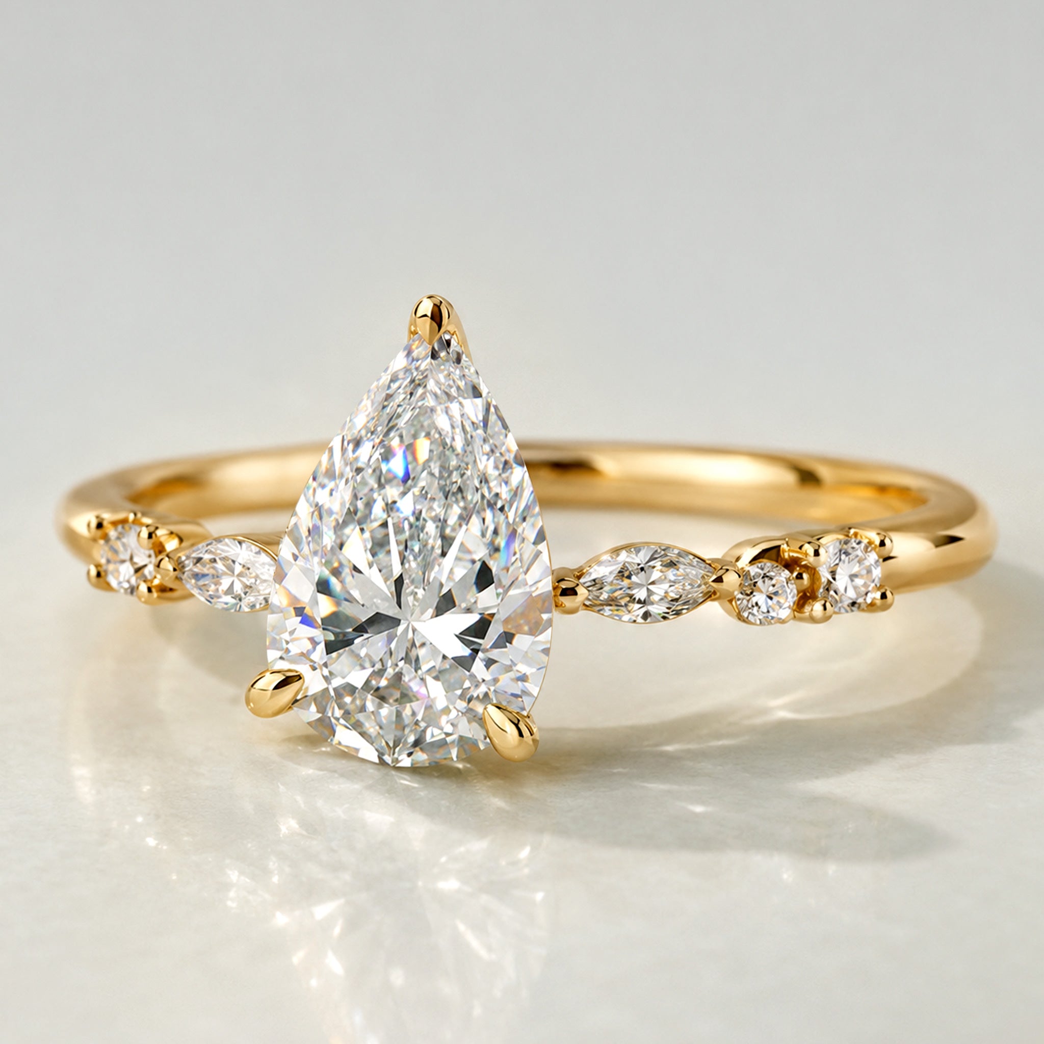Hidden Halo Design Pear Cut Lab Grown Diamond Center Stone Pave Shank Engagement Ring With Round Cut And Marquise Cut Accent Stones #MCERL0114