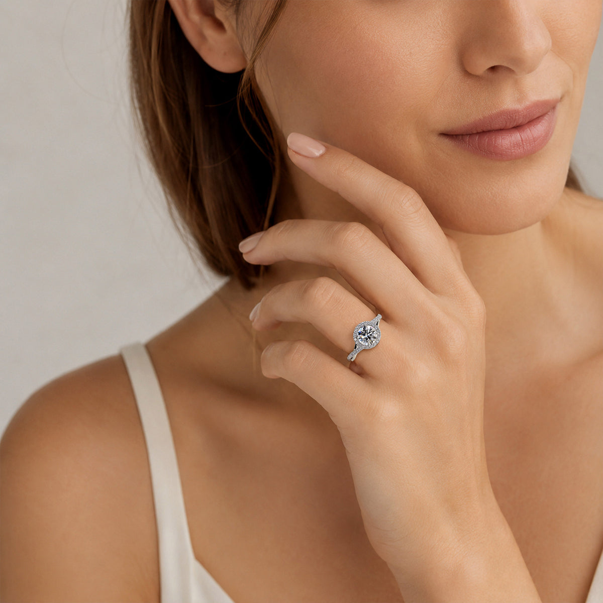 Modern Halo Design Round Cut Lab Grown Diamond Center Stone Twisted Pave Shank Engagement Ring With Round Cut Accent Stones #MCERL0197