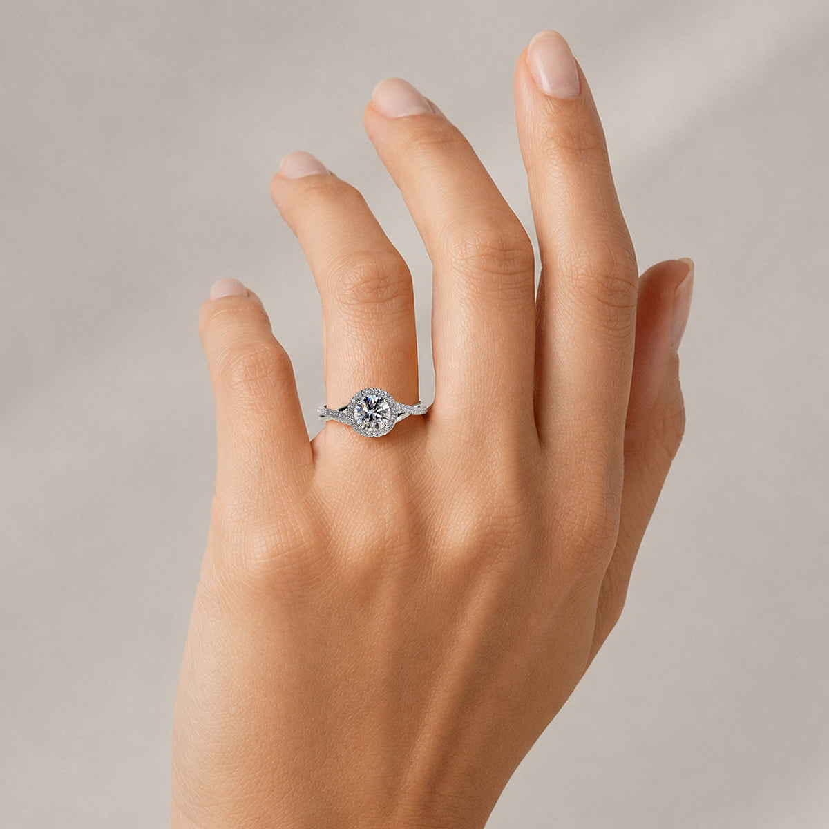 Modern Halo Design Round Cut Lab Grown Diamond Center Stone Twisted Pave Shank Engagement Ring With Round Cut Accent Stones #MCERL0197