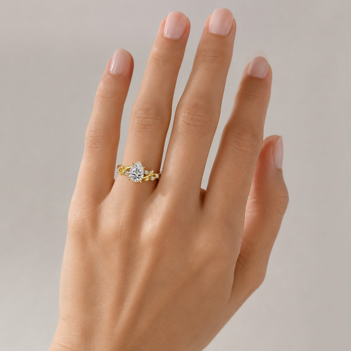 Nature Inspired Design Pear Cut Lab Grown Diamond Center Stone Engagement Ring With Round Cut Accent Stones #MCERL0220
